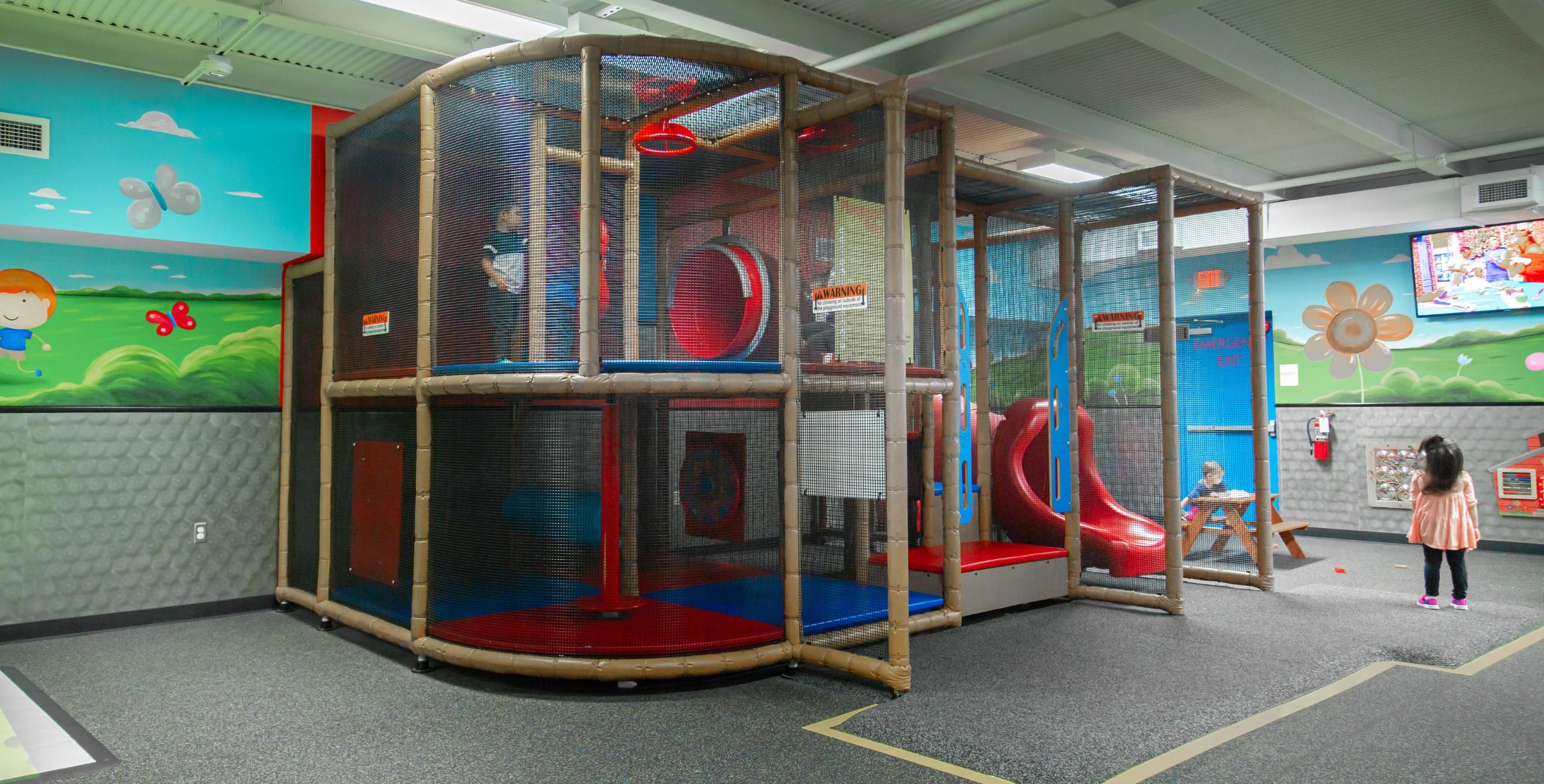 a slide and play area in the onsite childcare area at freedom fitness gym in airline corpus christi texas near me