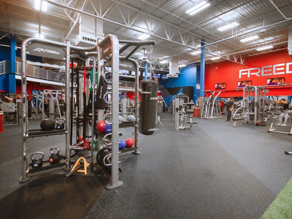 a spacious weight room with strength training amenities at freedom fitness gym in saratoga