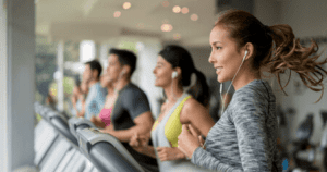 gym members jogging on treadmillls at corpus christi tx health club